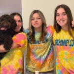 Three Girls Wearing Mr. Chimney T-shirt